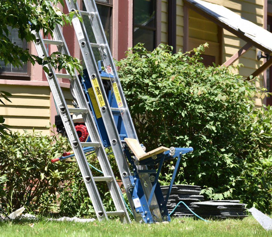 Slate stacked next to life.