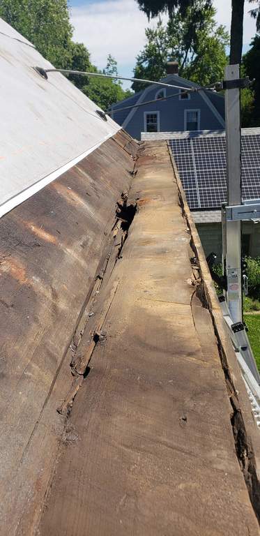 Northeast gutter bad shape.