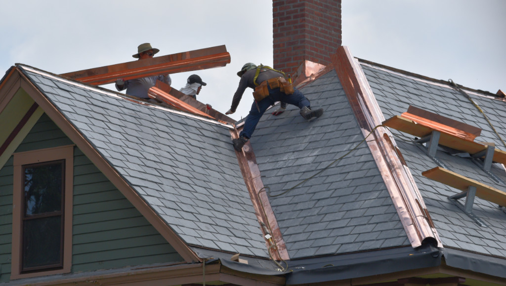 Ridge roll installation NW corner.